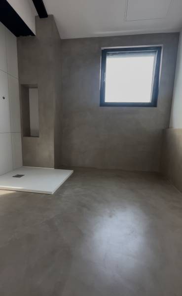 Pose d'un Béton Ciré spatulé dans la région de LYON